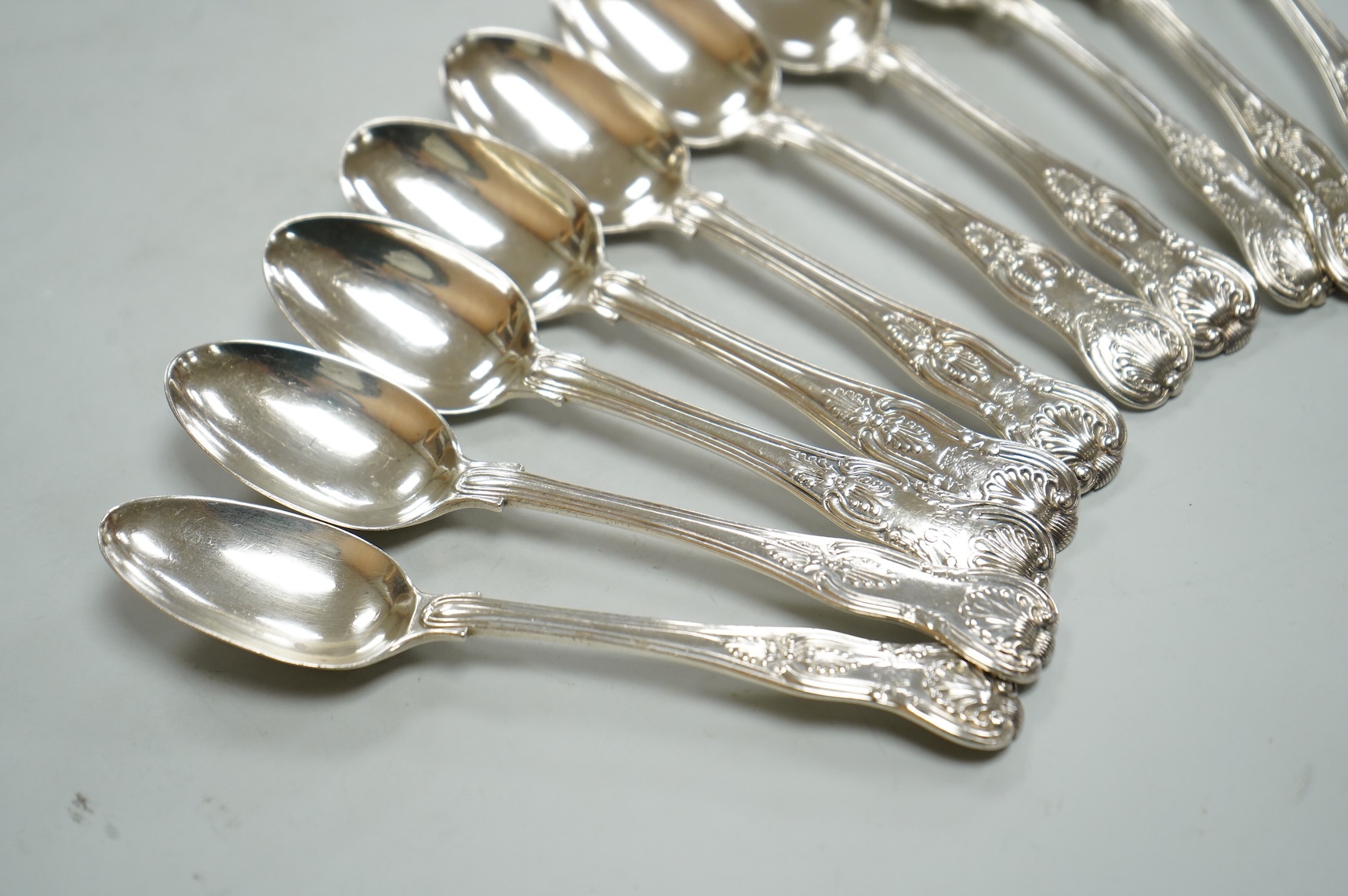 A matched set of ten William IV/Victorian silver Kings pattern teaspoons, including nine by Mary Chawner, London, 1834 and 1837, 11.5oz.